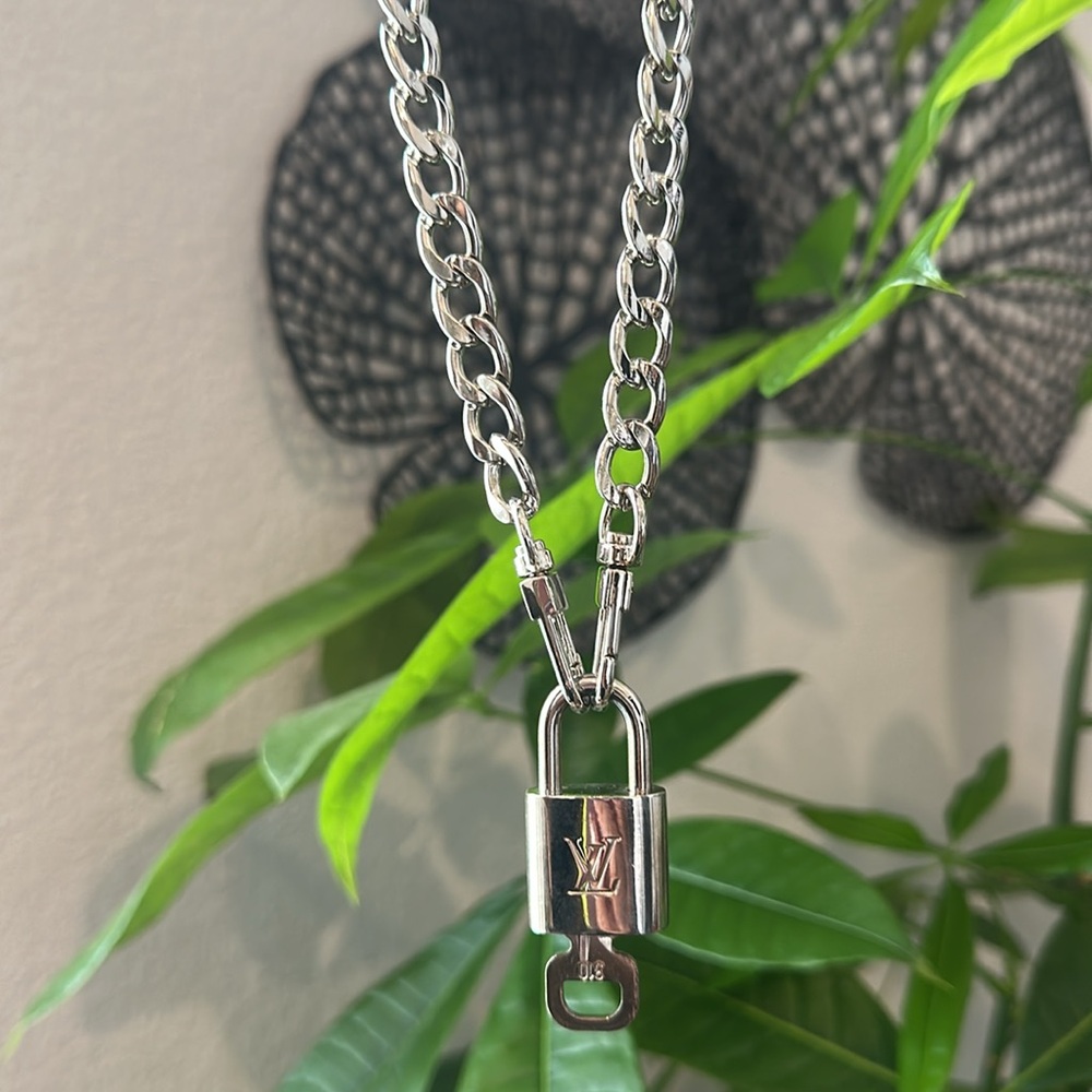 Authentic Louis Vuitton Silver Lock & Key with nonbranded necklace